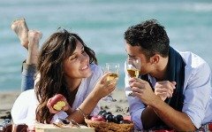 couple drinking wine on beach couple drinking wine on beach